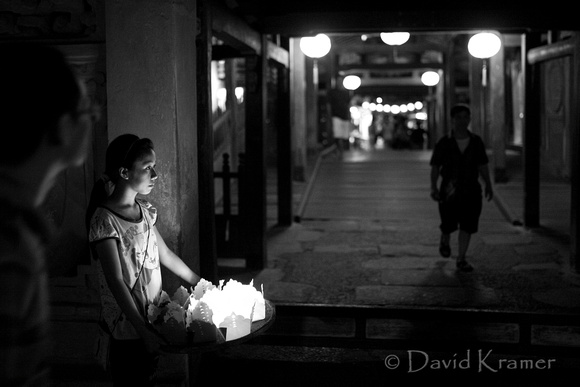 Girl selling candles